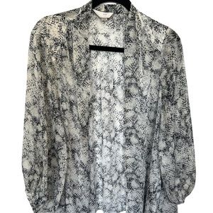 Size large sheer open blouse - able to tie at bottom.